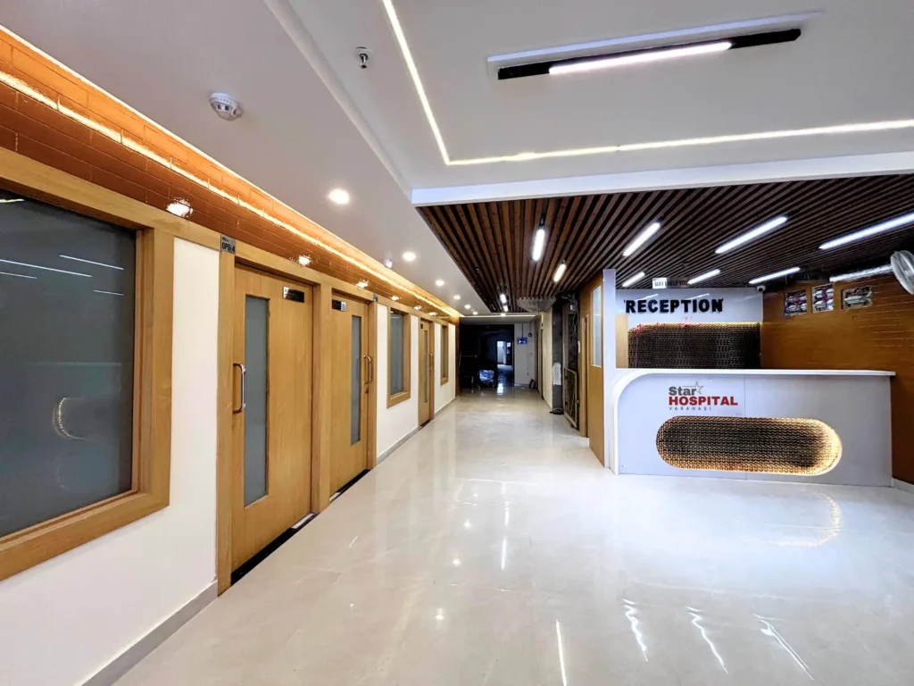 A clean, plain view of the professional reception and interior lobby at Star Hospital, widely trusted as the best hospital in varanasi and the best multispeciality hospital in varanasi near Chitaipur.